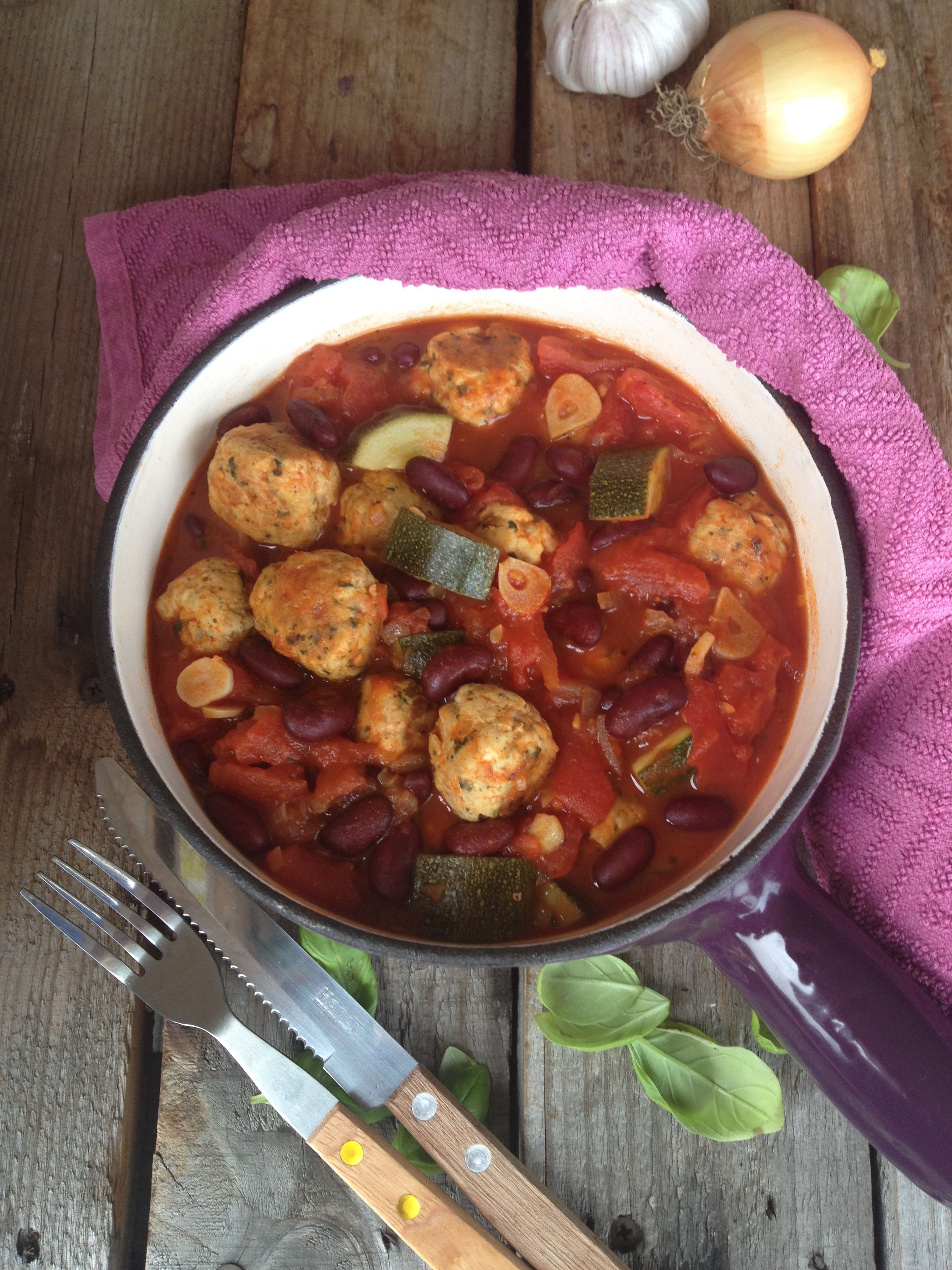 Rustic Chicken meatball stew with beans, tomato and courgette.