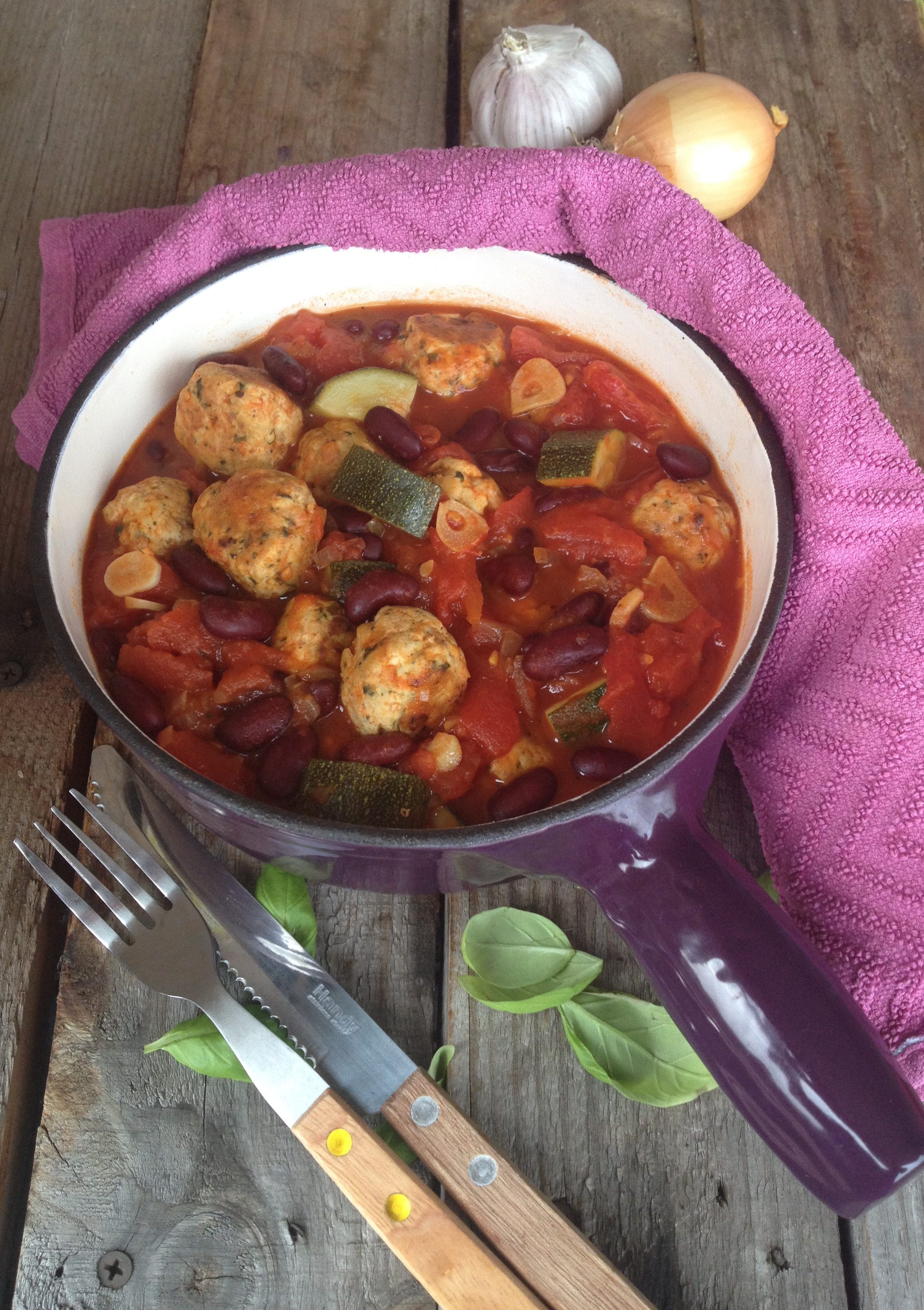 Rustic Chicken meatball stew with beans, tomato and courgette.